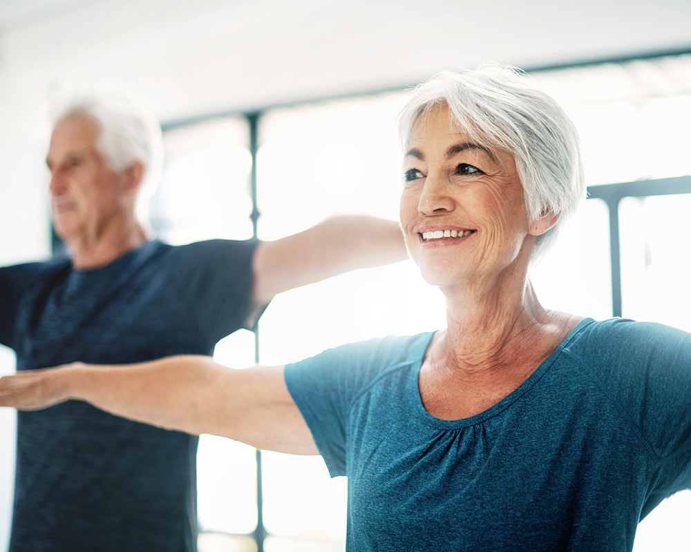 Frau und Mann beim Sport im Rahmen des Vital-Programms zur Förderung von Longevity